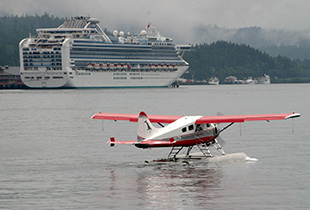 Island Wings takes off and lands on the waterway where  the cruise ships operate.