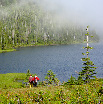 Island Wings clients on a self-guided hiking tour siteseeing in Misty Fiords southeast Alaska.
