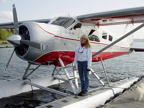 Michelle takes delivery of her new airplane at Kenmore Air Harbor ready to take clients on flightseeing trips to the Mist Fiords.